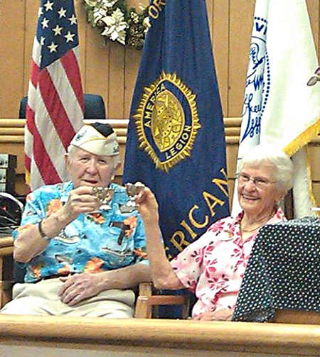 Pearl Harbor survivor Bill Slater and Alice Darrow, widow of sailor Dean Darrow, who also survived the attack, share a toast during the Pearl Harbor commemoration ceremony in Lakeport, Calif., on Sunday, December 7, 2014. Photo by Elizabeth Larson/Lake County News. 120714pearlharbortoast