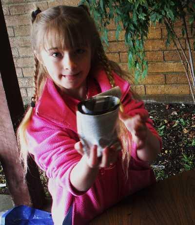 Abigail Tucker showing off her newspaper flower pot she made at the 4-H Fling. Courtesy photo. abbytucker4hfling