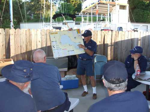 Gary Jolley gives directions and locations for the night search and rescue (SAR) and evolutions during the annual tie out, held Friday, June 1, and Saturday, June 2, 2012, in Lake County, Calif. Photo courtesy of Flotilla 88. 060112tieoutspeaker