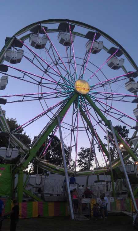 “The Century Wheel” towers over the midway at the Lake County Fair in Lakeport, Calif., on Thursday, August 29, 2013. Photo by Elizabeth Larson. 0813centurywheel