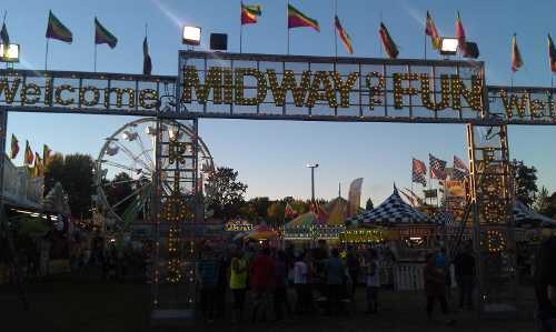 Fairgoers visited Midway of Fun's carnival on the opening night of the Lake County Fair in Lakeport, Calif., on Thursday, August 29, 2013. Photo by Elizabeth Larson. 082913midway