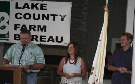 Craig Shannon, past Lake County Farm Bureau President, introducing the 2014 Lake County Farm Bureau Scholarship recipients Lindee Jones and Ian Seevers at the 91st annual meeting and dinner on Wednesday, July 16, 2014, in Lakeport, Calif. Photo courtesy of Lake County Farm Bureau. 071614lcfbstudents
