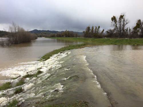 A levee in Maintenance Area 17-Lake County near Nice, Calif., overtopped on Wednesday, February 22, 2017, leading to an extended closure of the Nice-Lucerne Cutoff. Photo courtesy of Lake County Water Resources Director Phil Moy. 022217overtoppedlevee