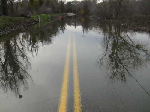 A stretch of the Nice-Lucerne Cutoff near Nice, Calif., remained underwater on Thursday, March 9, 2017, due to trapped water from an overtopped levee nearby. Photo by John Jensen/Lake County News. 030917jjnicelucernecutoff
