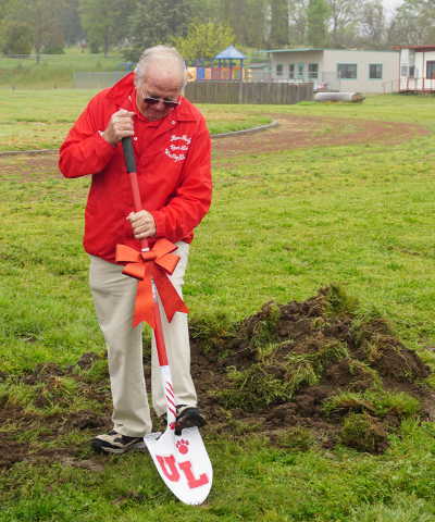 Ron Raetz, who for nearly a decade has led the effort to raise money to install lights at the stadium at Upper Lake High School in Upper Lake, Calif., breaks ground for the project on Monday, April 24, 2017. Photo by Elizabeth Larson/Lake County News. 042417ulhslightsraetzshovel