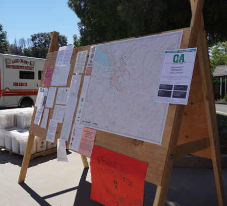 A bulletin board with information for Clayton fire survivors, seen here on Sunday, August 28, 2016, has been set up outside of the Lake County Fire Protection District’s Station 65 in Lower Lake, Calif. Photo by Elizabeth Larson/Lake County News. 082816lakecofireboard