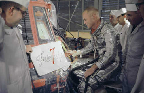 Astronaut John Glenn inspects artwork that will be painted on the outside of his Mercury spacecraft, which he nicknamed Friendship 7. On Feb. 20, 1962, Glenn lifted off into space aboard his Mercury Atlas (MA-6) rocket to become the first American to orbit the Earth. After orbiting the Earth 3 times, Friendship 7 landed in the Atlantic Ocean, just East of Grand Turk Island in the Bahamas. Glenn and his capsule were recovered by the Navy Destroyer Noa, 21 minutes after splashdown. Image Credit: NASA. glennfriendship7