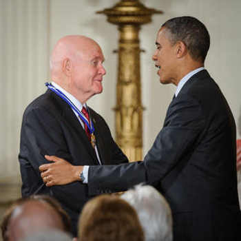 President Barack Obama congratulates former United States Marine Corps pilot, astronaut, and United States Senator John Glenn after presenting him with a Medal of Freedom, Tuesday, May 29, 2012, during a ceremony at the White House in Washington, DC. Credits: NASA/Bill Ingalls. johnglennmedal
