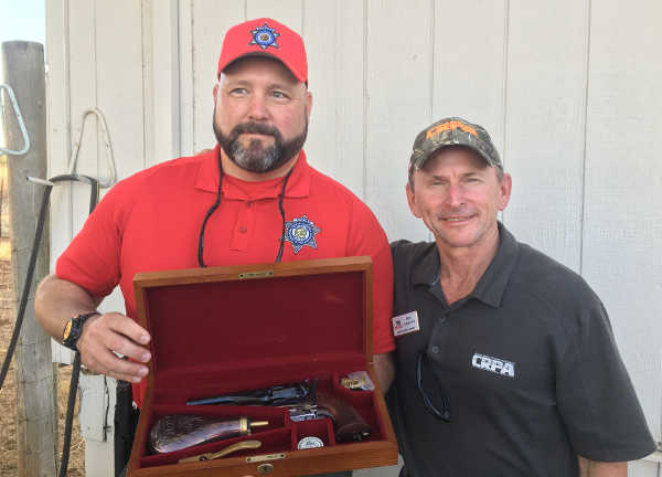 Roy Griffith, right, legislative liaison for the California Rifle & Pistol Association and a retired game warden, presented Michael Pascoe with the association’s Wildlife Officer of the Year Award on Wednesday, August 30, 2017. Courtesy photo. Pascoe named California Rifle & Pistol Association’s Wildlife Officer of the Year