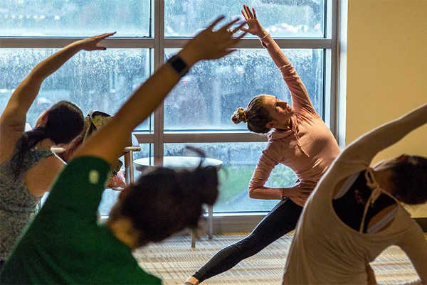 A yoga class at Boston University. Photo by Alexandra Wimley. Study: Yoga as good as physical therapy for chronic low back pain