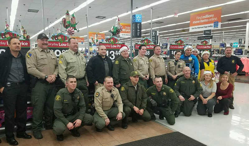 Lake County Deputy Sheriff's Association and other local law enforcement employee associations at a past “Shop with a Cop” event to benefit children in need. Courtesy photo. Deputy Sheriff’s Association hosts ‘Christmas in July’ fundraiser July 29